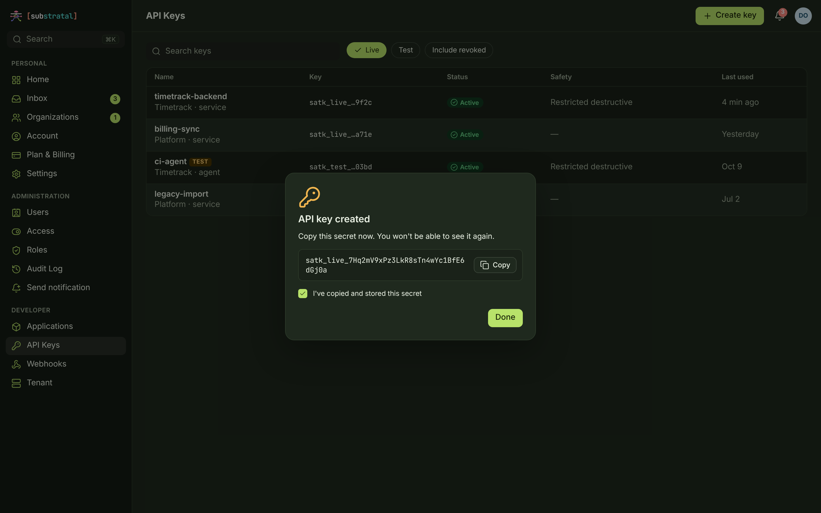 KEY-01 + KEY-03 · API keys, secret reveal — desktop — dark