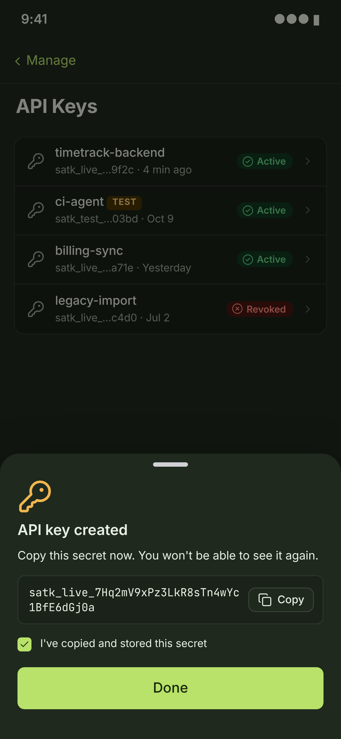 KEY-01 + KEY-03 · API keys, secret reveal — phone — dark